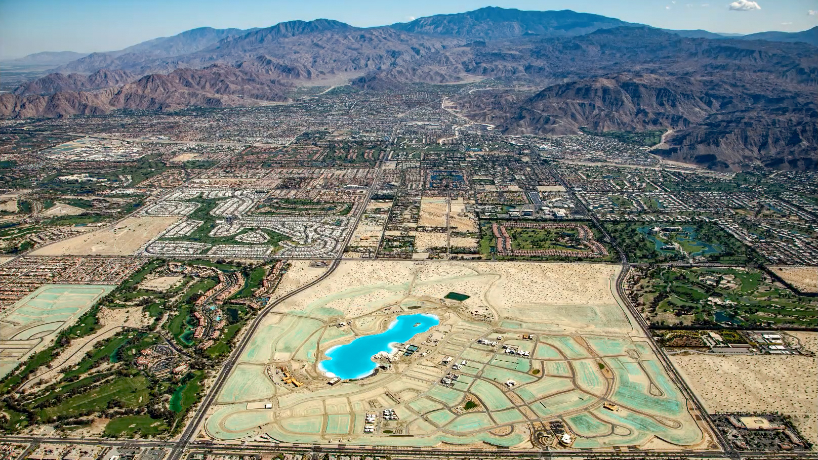 Aerial view of a lagoon anchoring a master-planned development